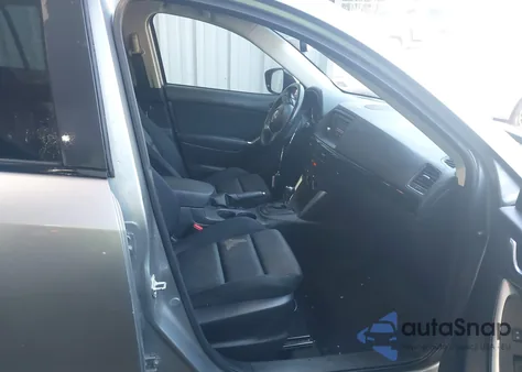 2014 Mazda Cx-5 Touring z USA, uszkodzony, nr VIN JM3KE2CY7E0317859